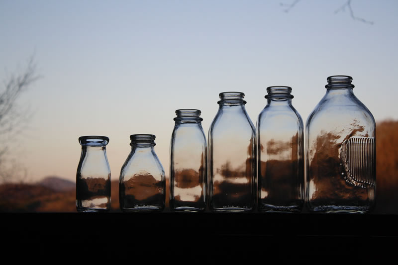 http://www.redhillgeneralstore.com/housewares/kitchen/kitacc/pics/Glass-Milk-Bottles-Sunset-Large.jpg