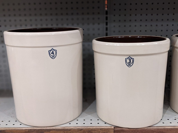 Ohio Stoneware 4 gallon and 3 gallon stoneware crocks with the gallon size stamped on the side