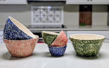 Ohio Stoneware spongeware mixing bowls in blue, green and poppy red